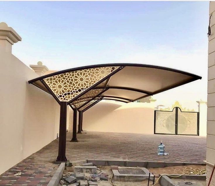 مظلات سيارات كابولي ليزر – حماية فائقة وتصميم معماري مودرن